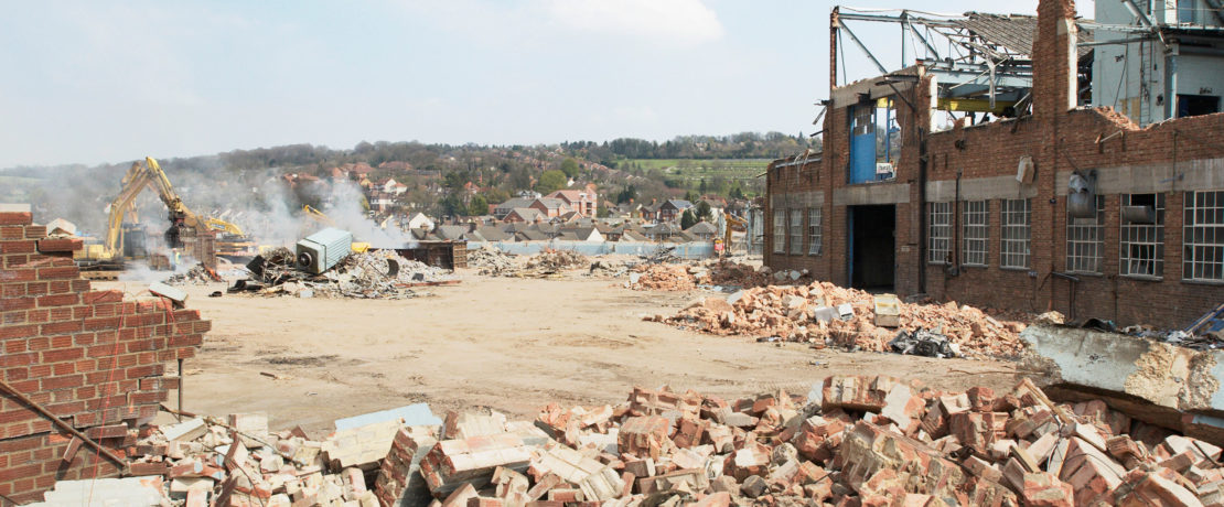 demolition in progress at a brownfield, or previously developed, industrial site, to prepare for redevelopment