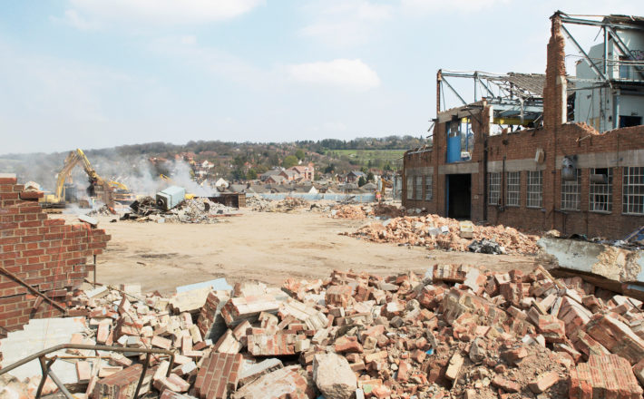 demolition in progress at a brownfield, or previously developed, industrial site, to prepare for redevelopment