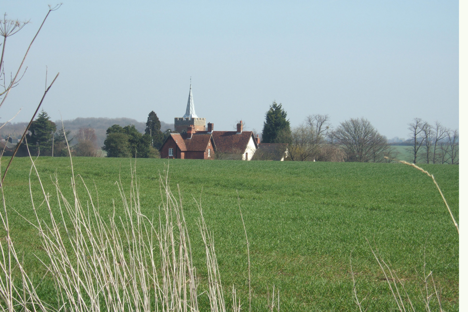 picturesque view of countryside and historic parish church