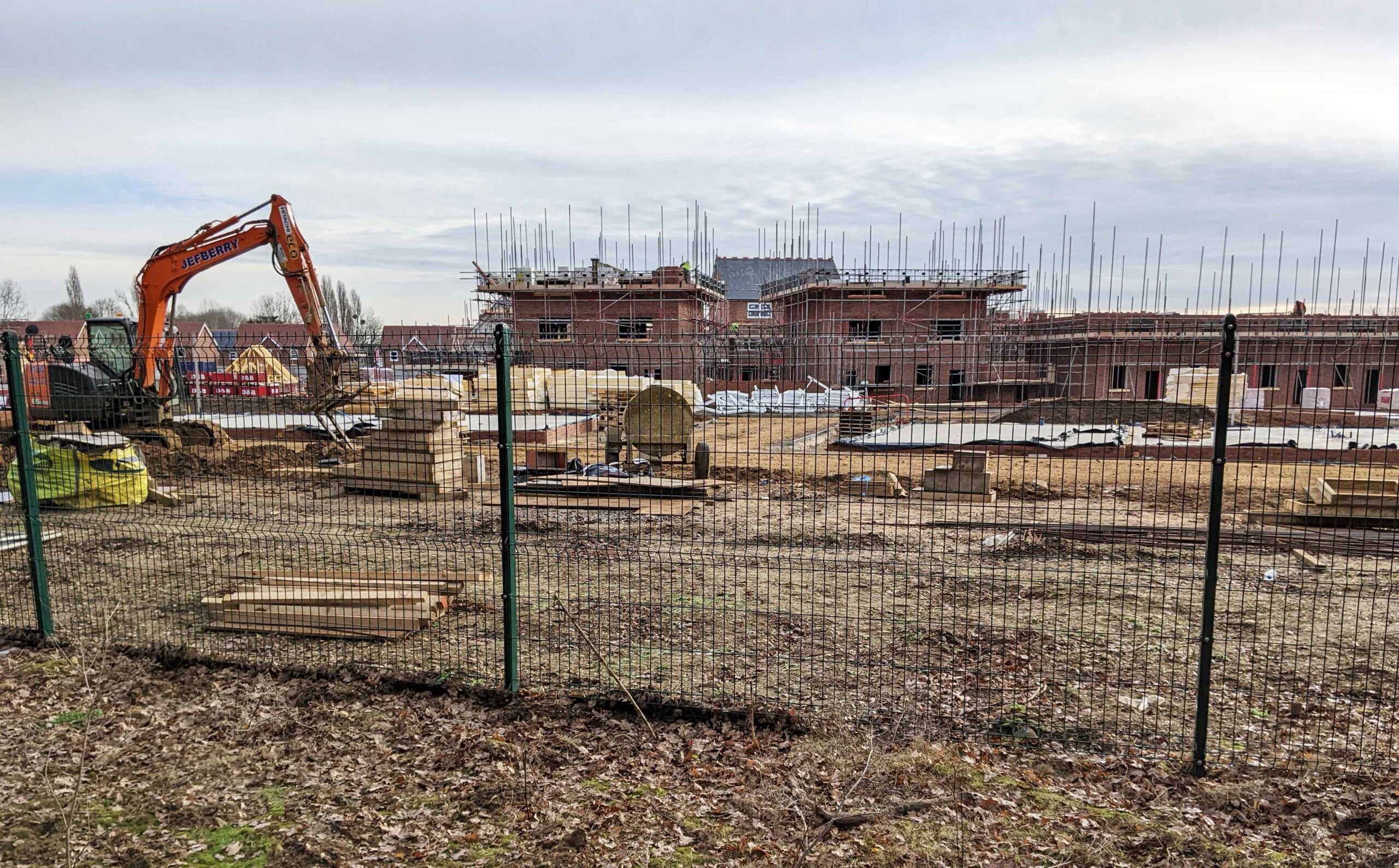 building site on on what had previously been lush green fields in the Green Belt