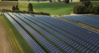 a solar farm on green fields