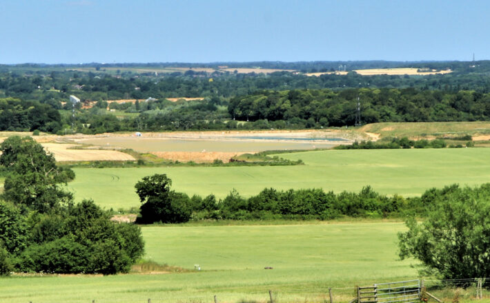 green fields, hedgerows and trees