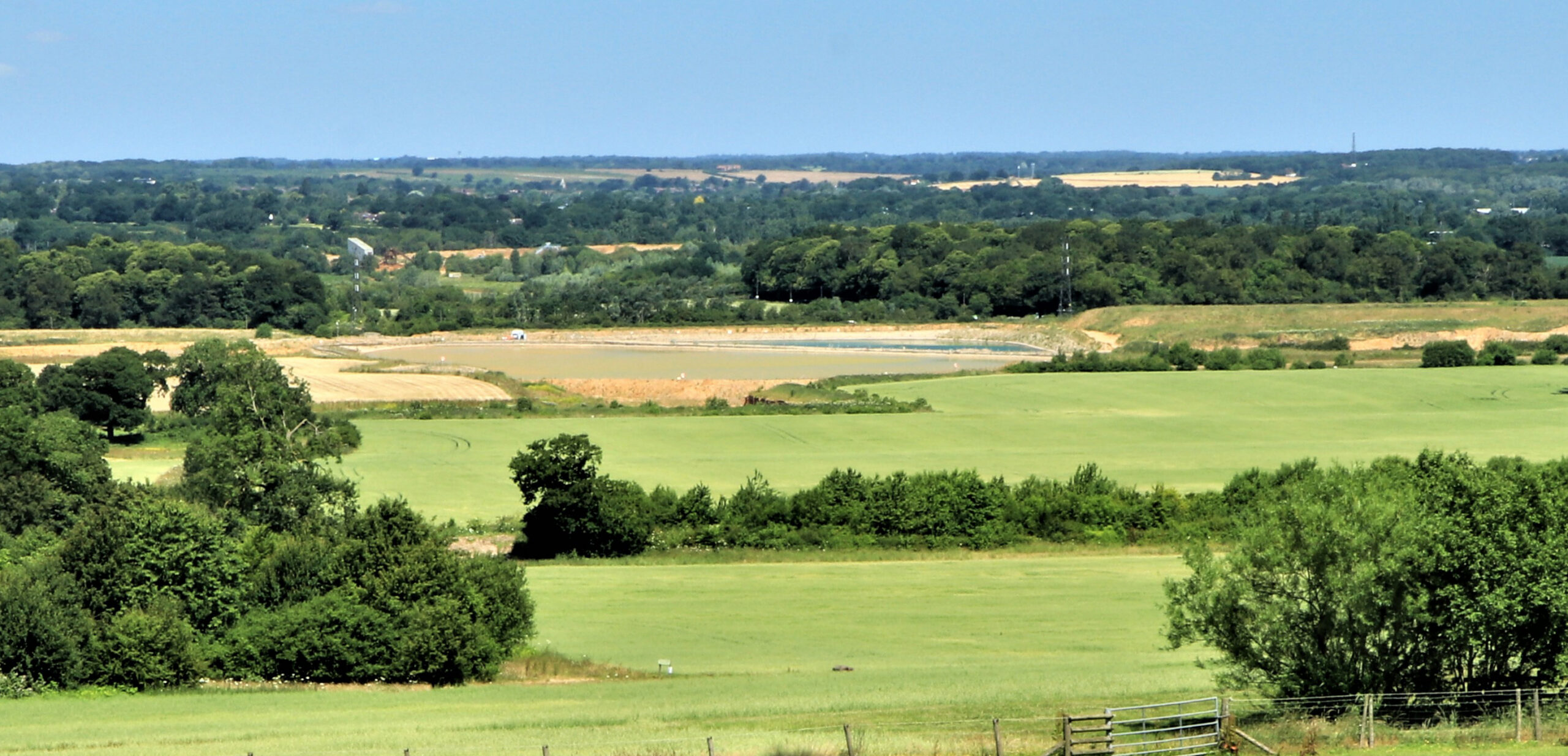 green fields, hedgerows and trees